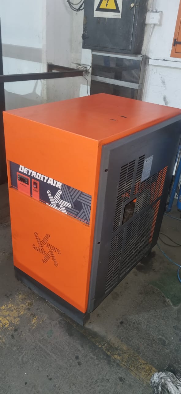An orange and grey Detroit Air screw compressor undergoing professional service by GP Compressors in a Germiston workshop. An orange and grey Detroit Air screw compressor undergoing professional service by GP Compressors in a Germiston workshop.
